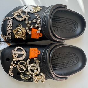 CROCS Black Clogs with Gold and Orange Accents